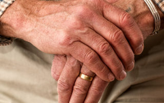 hands walking stick elderly old person