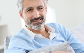 Middle aged man on sofa thm