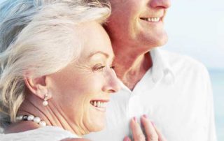 Woman and Man Standing, Looking into the distance