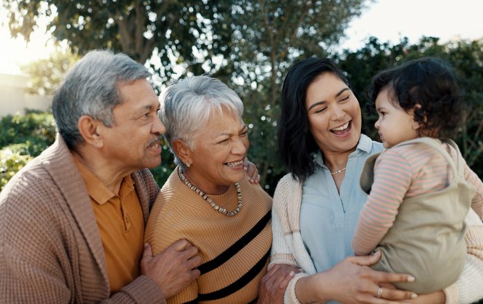 diverse family with grandparents, mother and child