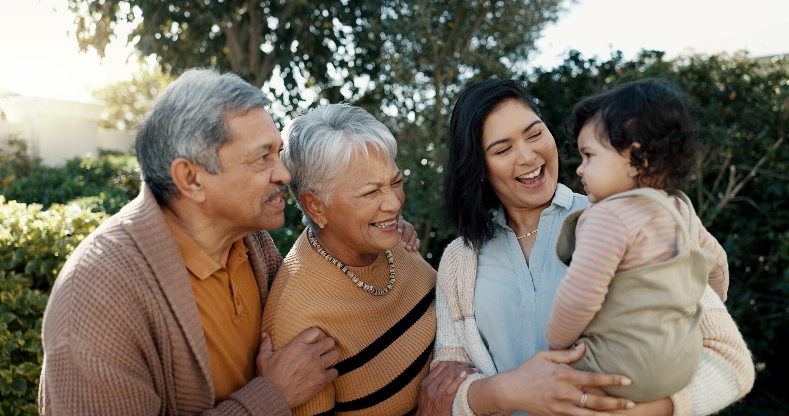 diverse family with grandparents, mother and child