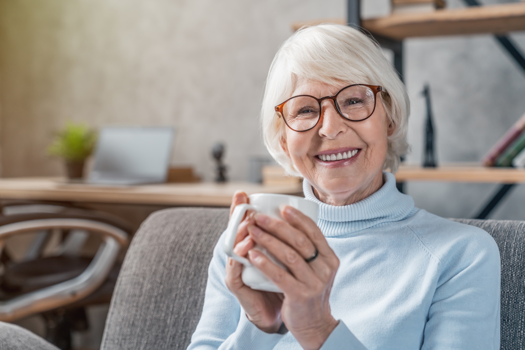 smiling-senior-woman-enjoying-cup-of-tea-at-home-2026-03-17-03-56-59-utc senior citizen aging at home